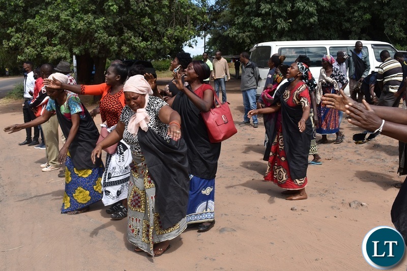 Women from the Mukuni Royal Establishment of Kazungula District yesterday protested outside the Livingstone Central police station demanding the release of Chief Mukini's wife who was arrested on Monday. Picture by KELVIN MUDENDA