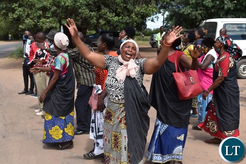 Women from the Mukuni Royal Establishment of Kazungula District yesterday protested outside the Livingstone Central police station demanding the release of Chief Mukini's wife who was arrested on Monday. Picture by KELVIN MUDENDA