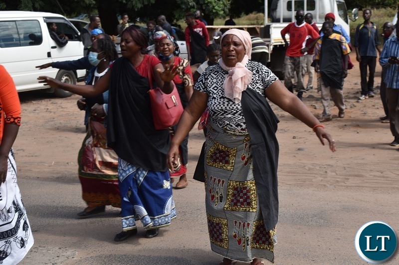 Women from the Mukuni Royal Establishment of Kazungula District yesterday protested outside the Livingstone Central police station demanding the release of Chief Mukini's wife who was arrested on Monday. Picture by KELVIN MUDENDA