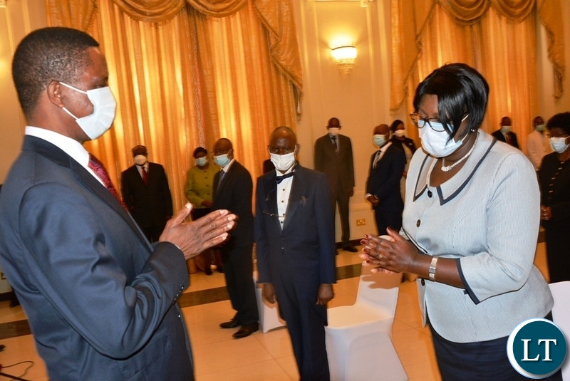 President Edgar Lungu congratulate justice Flugency Chisanga after she was sworn in as Supreme Court Judge at State House