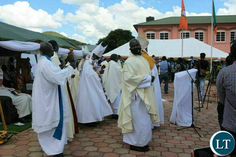 THE Anglican Church clergy dance to a song during the commissioning of the John Osmas Anglican church building in Chipata yesterday. PICTURE BY STEPHEN MUKOBEKO/ZANIS