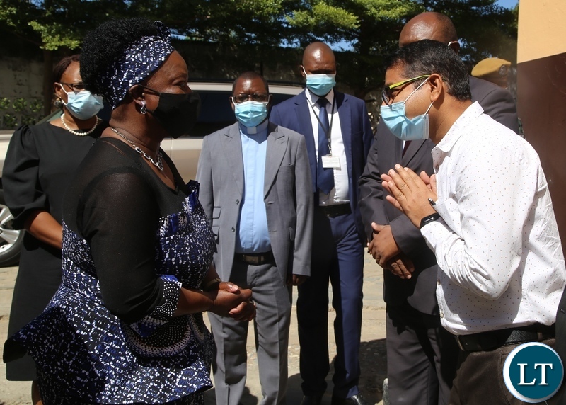 First Lady Esther Lungu greets AFCON planning and Coordination Manager Sachin Zende who donated food hampers to Kizoto Parish in Lusaka. Picture by SUNDAY BWALYA/ZANIS