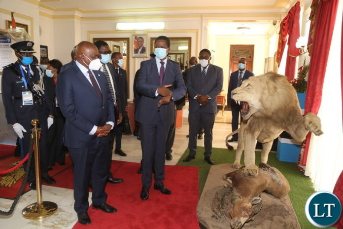 President Edgar Lungu shows his Botswana counterpart Dr.Mokgweetsi Eric Masisi a staffed lion when he paid a courtesy call on him at State House