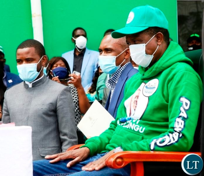 President Edgar Lungu (right) waits patiently for his nomination papers to be verified by PF Secretary General Davies Mwila during the filling in of nominations at the PF Secretariat. Picture by SUNDAY BWALYA/ZANIS President Edgar Lungu (right) waits patiently for his nomination papers to be verified by PF Secretary General Davies Mwila during the filling in of nominations at the PF Secretariat. Picture by SUNDAY BWALYA/ZANIS