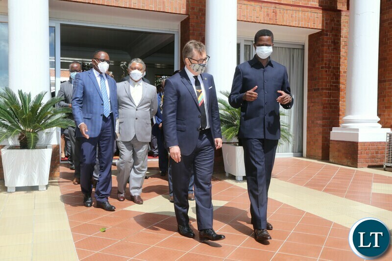 ,President Edgar Lungu talks to European Union Ambassador Mr.Jacek Jankowski when EU delegation paid a courtesy call on him at State House