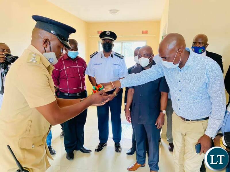 Chongwe Member of Parliament Japhen Mwakalombe at the handover ceremony of Housing Units for the Police Officers