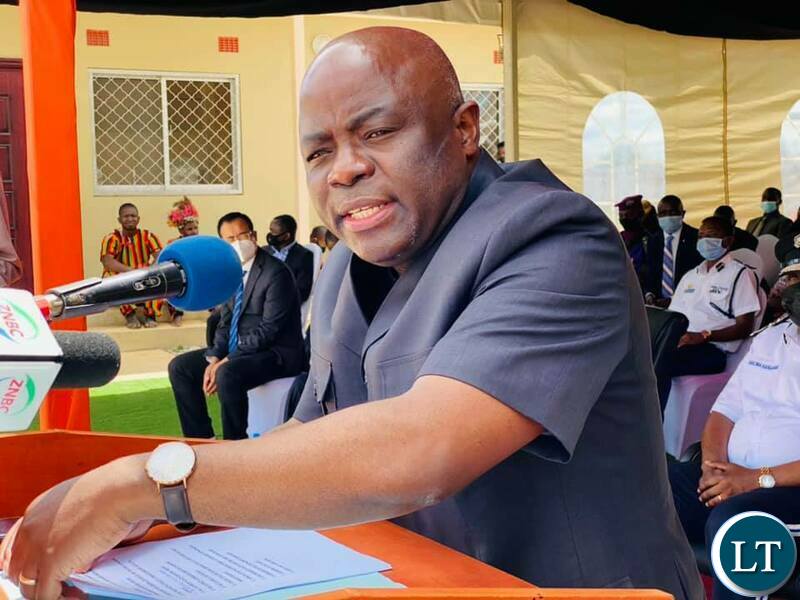 Home Affairts Minister Stephen Kampyongo Speaking  at the ceremony to  commission and hand over six housing units constructed by ZTE in Chongwe