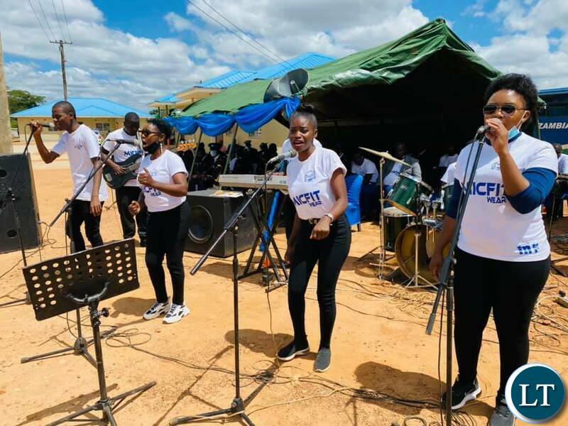 A band performing at the ceremony to  commission and hand over six housing units constructed by ZTE in Chongwe