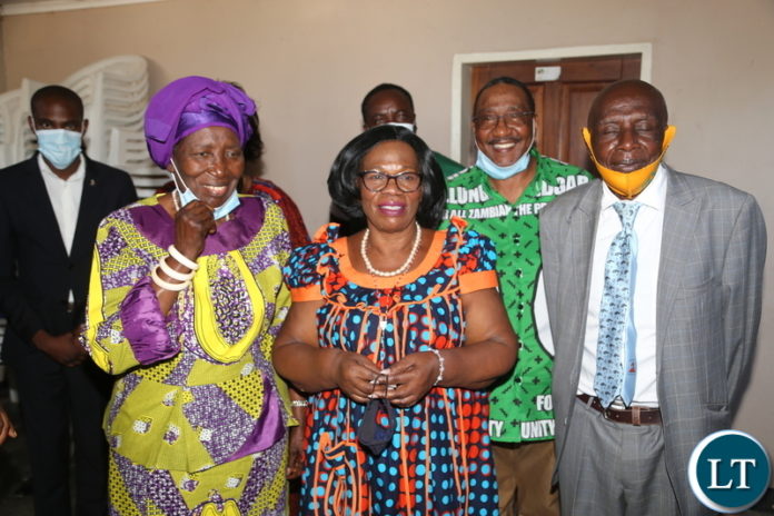 Senior Chief Chitimukulu of the Bamba speaking people confers Vice President Inonge Wina and President Edgar Lungu presidential running mate Prof. Nkandu Luo seated on the floor during the courtesy call at his palace in Mungwi yesterday. Saturday, May 22, 2021. Picture by ROYD SIBAJENE/ZANIS