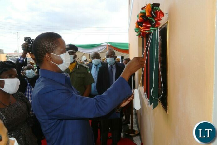 ,President Edgar Lungu unveils a plaque to officially Commission the newly belt Kanyama Police Station in Lusaka