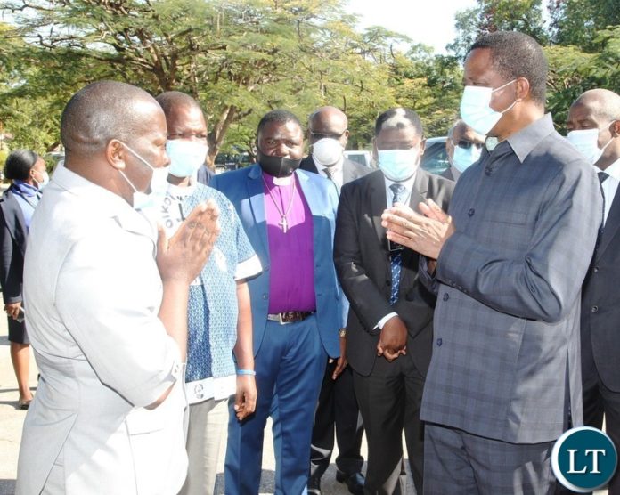 PRESIDENT Edgar Lungu confers with Rev.Ccanon Robert Sihubwa of St Peter's Anglican church on arrival at National Prayer initiative for 2021 peaceful elections at Cathedral of the Holy Cross in Lusaka. PRESIDENT Edgar Lungu confers with Rev.Ccanon Robert Sihubwa of St Peter's Anglican church on arrival at National Prayer initiative for 2021 peaceful elections at Cathedral of the Holy Cross in Lusaka.