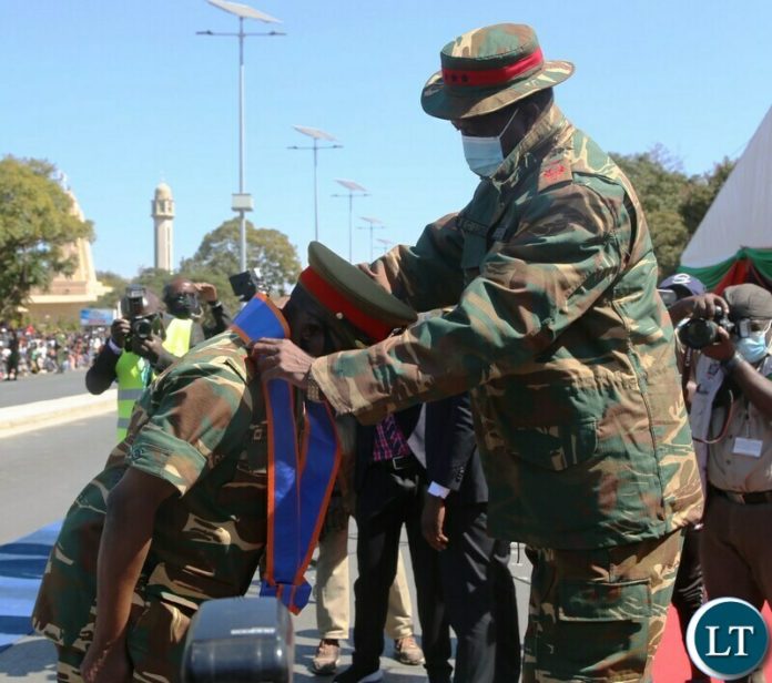 President Edgar Lungu bestows a medal on Lt William Sikazwe for the positive contributions to the Zambia Army during defence day in Lusaka.Picture by SUNDAY BWALYA/ ZANIS President Edgar Lungu bestows a medal on Lt William Sikazwe for the positive contributions to the Zambia Army during defence day in Lusaka.Picture by SUNDAY BWALYA/ ZANIS