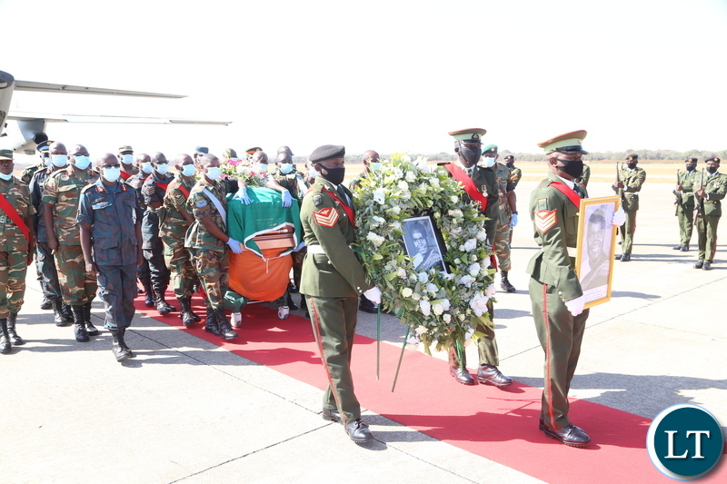 Men in uniform carrying the remains of the late first Zambian President Dr Kenneth Kaunda at Simon Mwansa Kampwepwe international airport yesterday. Monday, June 28, 2021. Picture by ROYD SIBAJENE/ ZANIS