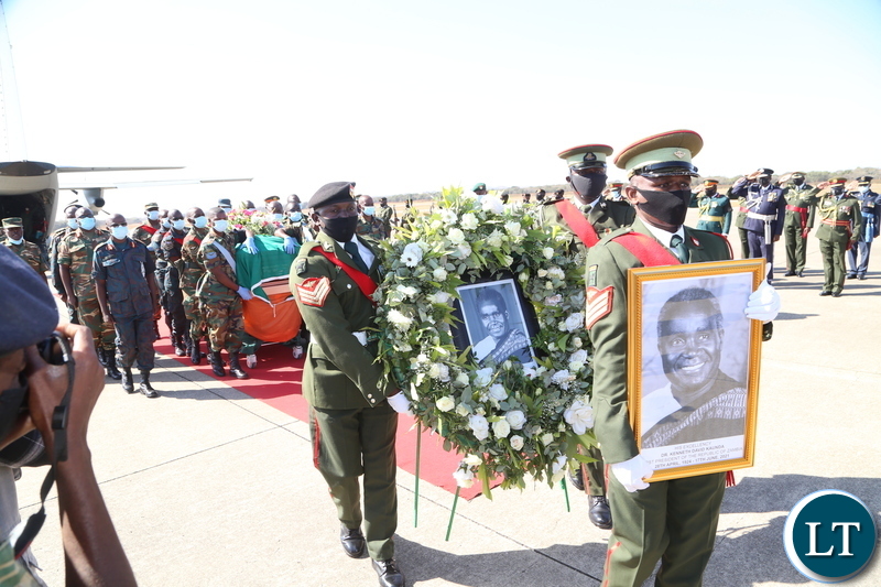Men in uniform carrying the remains of the late first Zambian President Dr Kenneth Kaunda at Simon Mwansa Kampwepwe international airport yesterday. Monday, June 28, 2021. Picture by ROYD SIBAJENE/ ZANIS