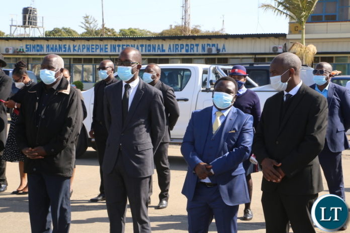 Deputy Secretary to the Cabinet Patrick Kangwa, Capperbelt permanent Secretary Bright Nundwe, Lusaka Province Permanent Secretary Elais Kamanga and Col. Kaunda son to the late first Zambian President Dr Kenneth Kaunda at Ndola airport waiting to receive the remains of Dr.Kunda yesterday. Monday, June 28, 2021. Picture by ROYD SIBAJENE ZANIS Deputy Secretary to the Cabinet Patrick Kangwa, Capperbelt permanent Secretary Bright Nundwe, Lusaka Province Permanent Secretary Elais Kamanga and Col. Kaunda son to the late first Zambian President Dr Kenneth Kaunda at Ndola airport waiting to receive the remains of Dr.Kunda yesterday. Monday, June 28, 2021. Picture by ROYD SIBAJENE ZANIS