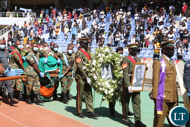 Men in uniform  carrying the remains of the late first Zambian President Dr Kenneth Kaunda at Levy Mwanawasa Stadium during the church service in Ndola yesterday. Monday, June 28, 2021. Picture by ROYD SIBAJENE ZANIS