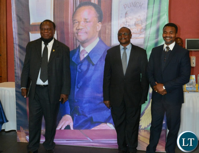 Darlington Chiluba(m)a ,Brig.Gen.apostle Vincent Mwenya(m) and former Press aide, Richard Sakala(left) pose for a photograph during the 2nd memorial lecture in honour of late republican president Dr. Titus Chiluba in Lusaka.