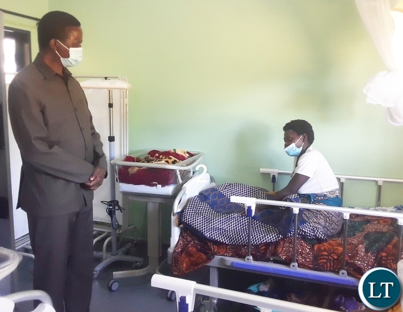 President Edgar Lungu talks to the mother who just delivered a baby boy during the commissioning of Chikonshi Mini Hospital in Chief Matanda's Chiefdom in Mansa district. Picture by SUNDAY BWALYA ZANIS