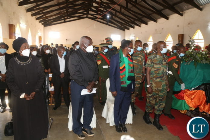 Vice President Ms Inonge Wina,Panji Kaunda and Dmmu National Coordinator Chanda Kabwe paying their last respect to Dr.Kaunda's body during a church service at UCZ all Saints in Mongu