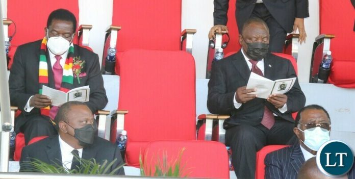 SADC leaders, Zimbabwean President Emerson Mnagangwa, President of Southern Cyril Ramaphosa, Kanyen President Uhuru Kenyatta and Namibian President Hage Geingob following the proceeding during the state funeral for late President Kaunda at the show grounds yesterday. Friday, July 02, 2021. Picture by ROYD SIBAJENE/ZANIS