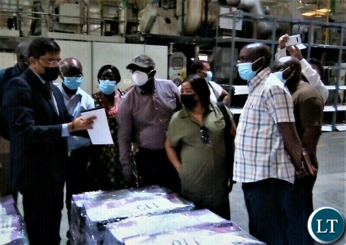Al Ghurair explaining features on ballot papers as stakeholders look on