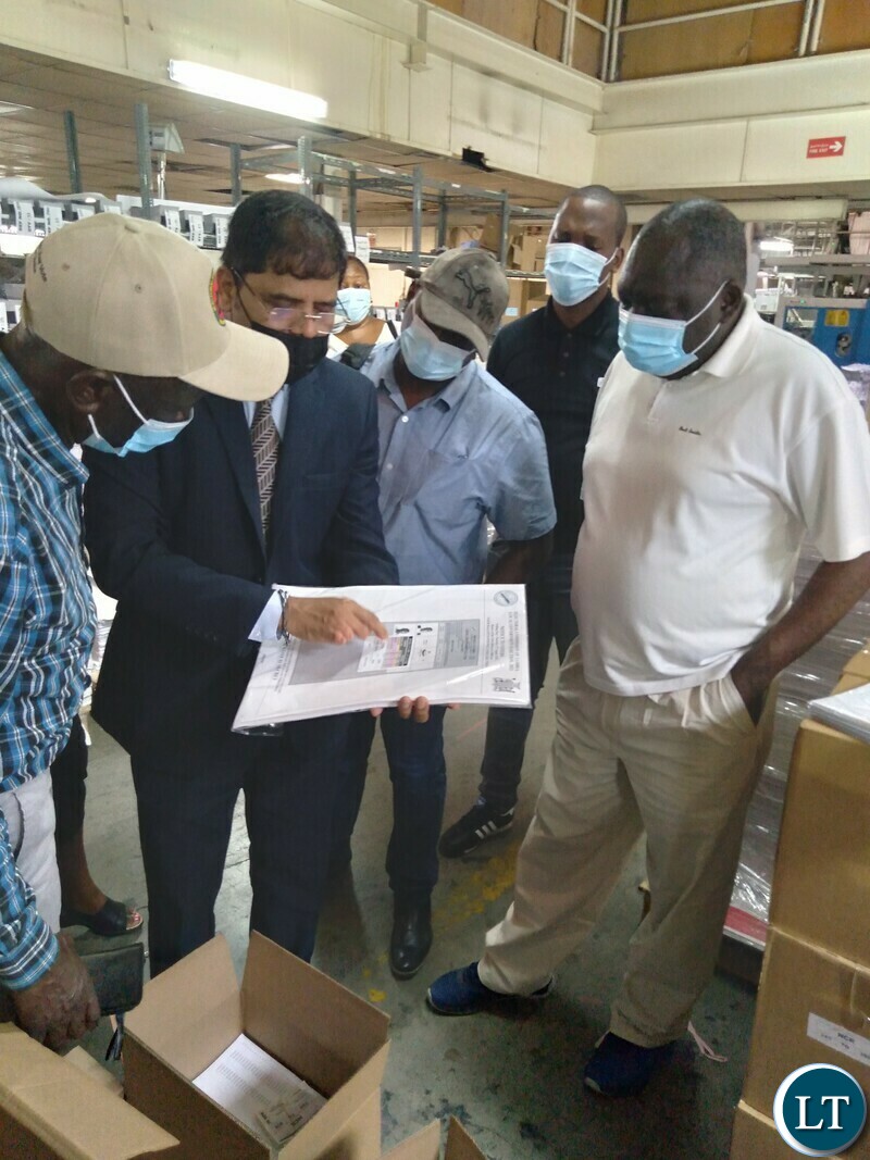 ECZ Commissioner Ali Simwinga with stakeholders listening to Al Ghurair managerment explaining
