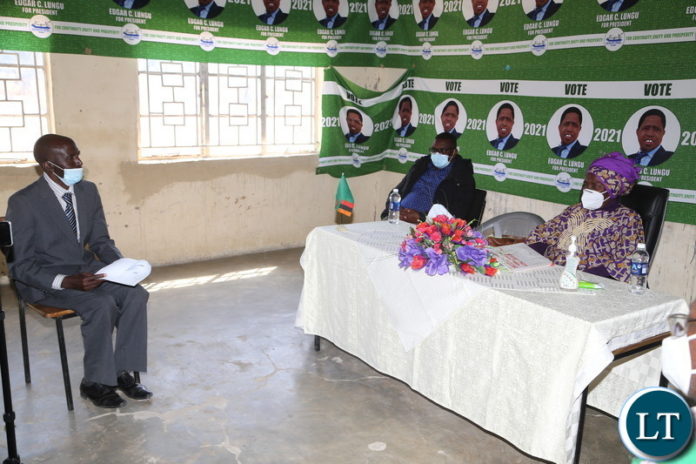 Ngabwe District Commissioner Willard Rundale briefing the Vice President Inonge Wina who is flanked by Central province Permanent Secretary Benard Chomba about the developmental projects in Ngabwe District