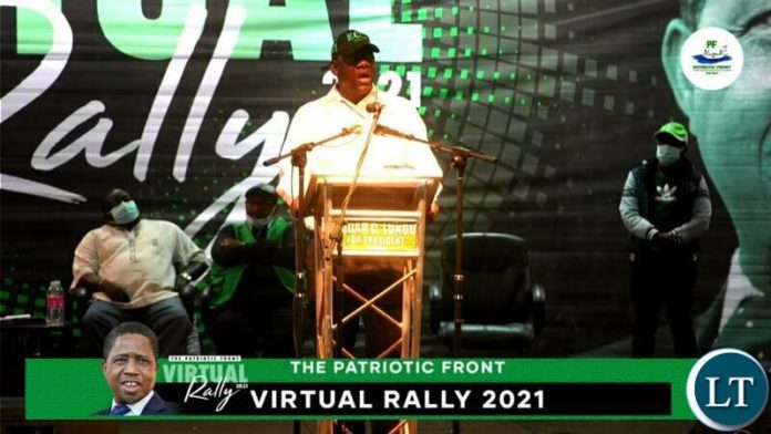 PF SG at the PF Virtual Rally, while Chishimba Kambwili looks on