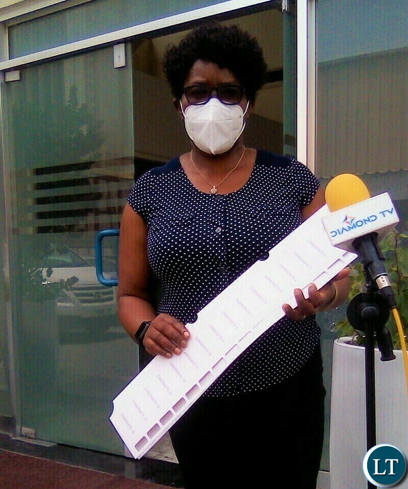 NGOCC Executive Director Engwase Mwale with braille bracket