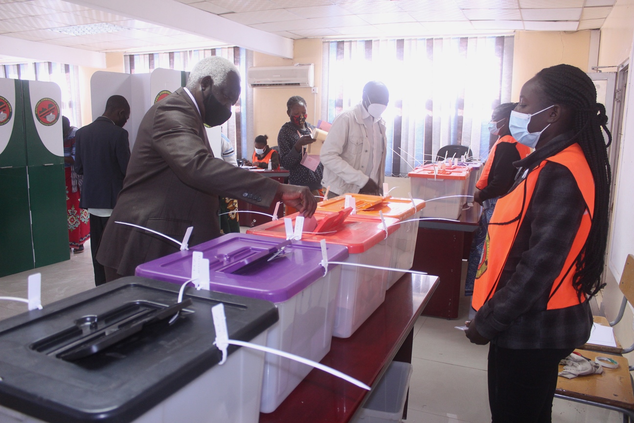 Polling assistants verifying the names of voters at Kamulanga Primary School in Kabwata Constituency