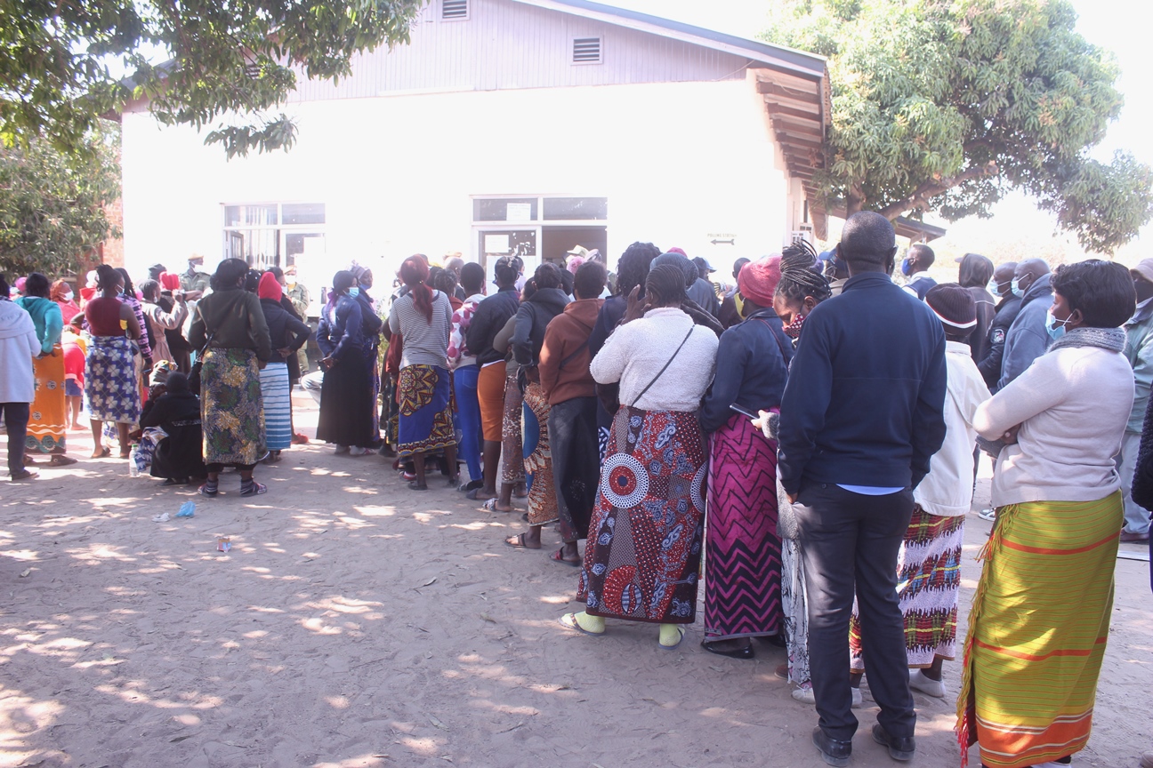 Kamulanga Primary School Polling Station Polling Officer  Mr. Nkhata making sure voters are doing the right things at Kamulanga Primary School in Kabwata Constituency