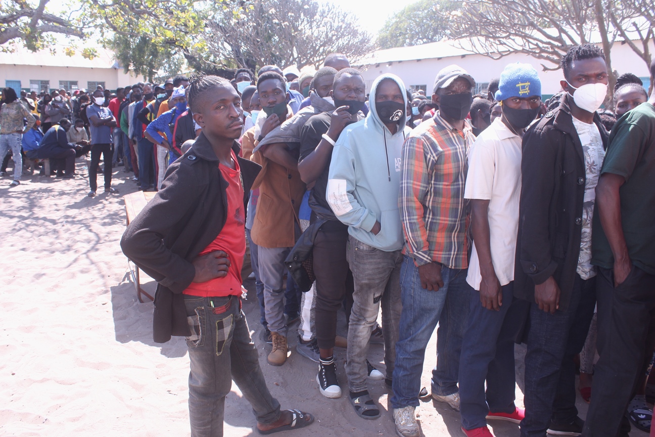Thousands of people queue to cast their votes at Kamulanga Primary School in Kabwata Constituency 