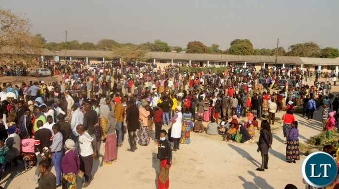 VOTERS at Muchinka Polling station in Mansa central constituency line-up to cast their votes.
