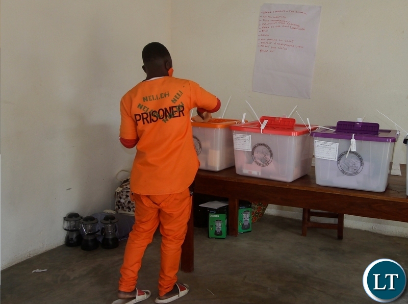An inmate casting his  vote at Mansa correctional services polling station in Mansa Central constituency.
