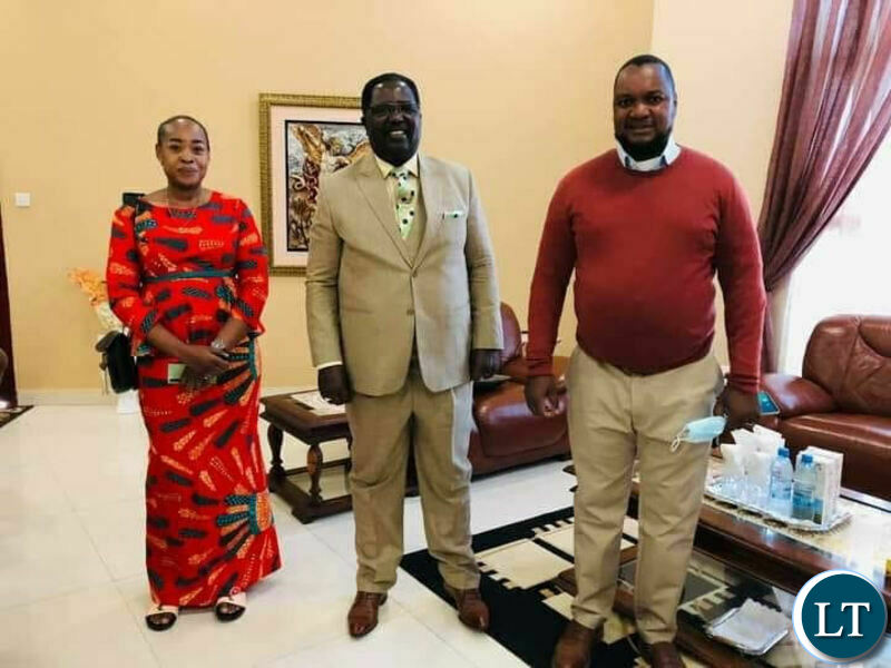 Bishop Imakando, Miles Sampa and Annie Chinyanta shortly after the church service last Sunday.