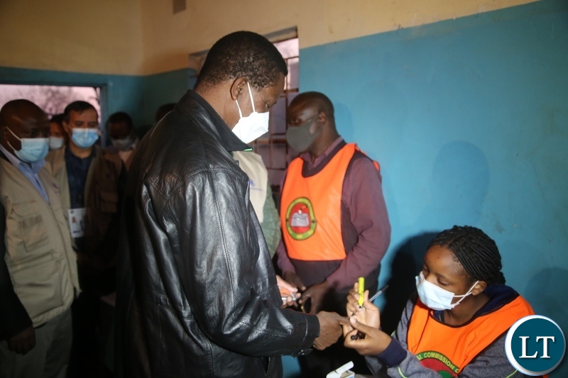 PRESIDENT Edgar Lungu at Andrew Mwenya,Crawford polling station in Chawama today.