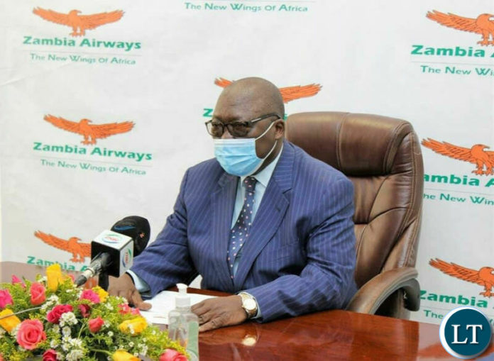Zambia airways Board Chairperson Mr Bonaventure Mutale speaking at the news briefing