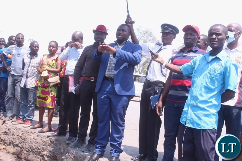 Mongu Mayor Nyambe Matakala (blue suit) denouncing caderism and calling for formation of a new committee in order for sanity to prevail during his address to markerteers at Mongu Central Market in Mongu Western Province