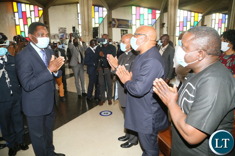 President Hakainde Hichilema greet opposition party leaders Nevers Mumba and Harry Kalaba during the National Ecumenical thanksgiving prayer peaceful elections that were recently held in Zambia at the Anglican Cathedral of the Holy Cross. Sunday, September 19, 2021. Picture by ROYD SIBAJENE ZANIS