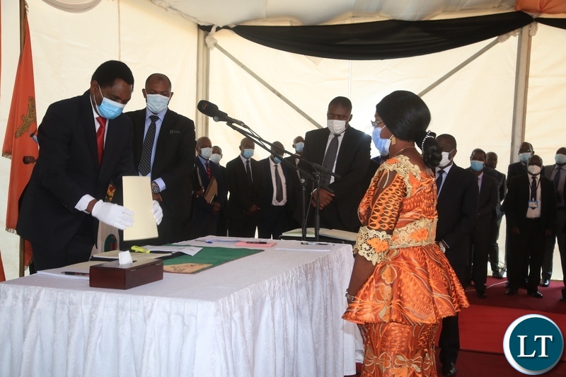 PRESIDENT Hakainde Hichilema with Minister of Health, Sylvia Masebo at swearing -in ceremony in Lusaka.