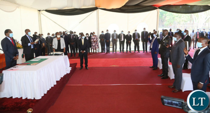 Newly appointed cabinet Ministers taking oath before Hakainde Hichilema during swearing in ceremony at State House Newly appointed cabinet Ministers taking oath before Hakainde Hichilema during swearing in ceremony at State House