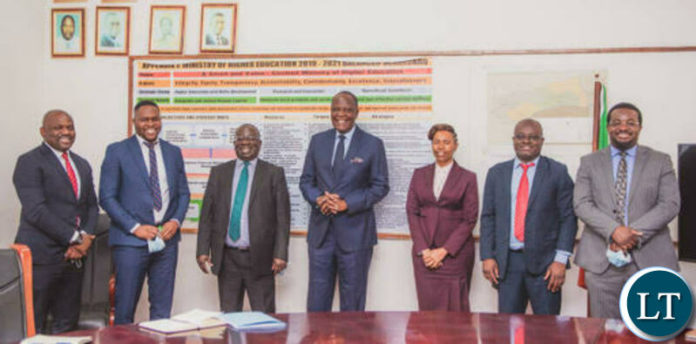 Technology and Science Minister Felix Mutati with a team from Zamtel after they paid a courtesy call on him
