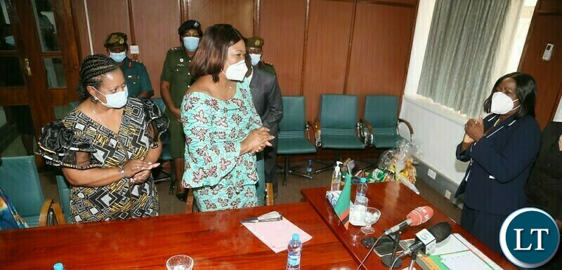 Vice President Mutale Nalumango greets the Wife of Zambia Army Commander Stella Alibuzwi and wife of Zambia Airforce Commandant Sharmaine Barry during the courtesy call of the Service Chiefs spouses at her office 