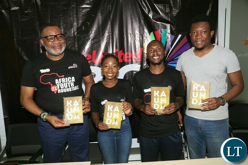 Initiator, One united Africa Congressman Bimbo Daramola, One Africa Organnising team Mwangala Sipumo,Member Aaron Mondoka and Author of the Book take me to kaunda Lloyd Mwiinga during the media briefing in preparation of celebrating African Union Youth Day which falls in 1st November, at Asmara hotel in Lusaka