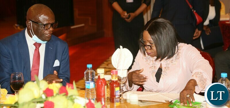 Vice President Mutale Nalumango confers with UPND National Chairman Stephen Katuka during the Vice President fundraising Gala Dinner at Golden Peacock hotel 