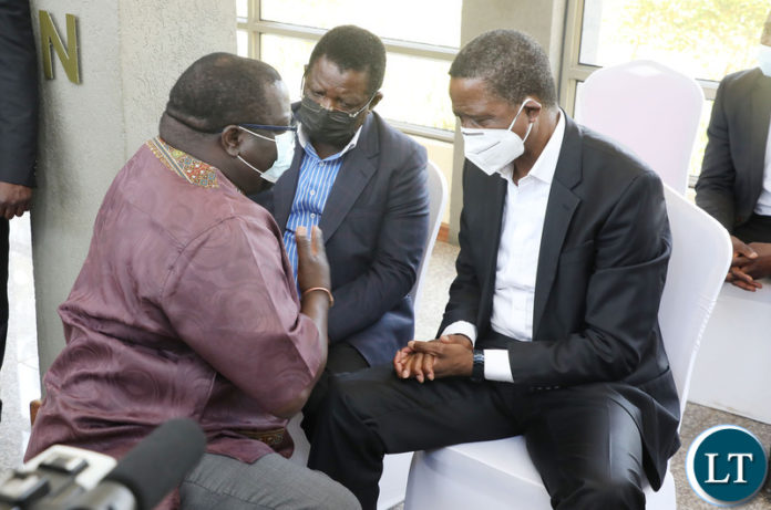 Chishimba Kambwili speaks with Simon Mukupa and Former President Edgar Lungu during Late President Michael Sata's memorial Mass at Embassy Park in Lusaka on Thursday, October 28,2021-Picture by THOMAS NSAMA/ZANIS