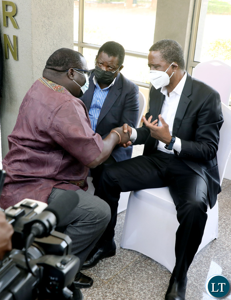 Chishimba Kambwili speaks with Simon Mukupa and Former President Edgar Lungu during Late President Michael Sata's memorial Mass at Embassy Park in Lusaka on Thursday, October 28,2021-Picture by THOMAS NSAMA/ZANIS     