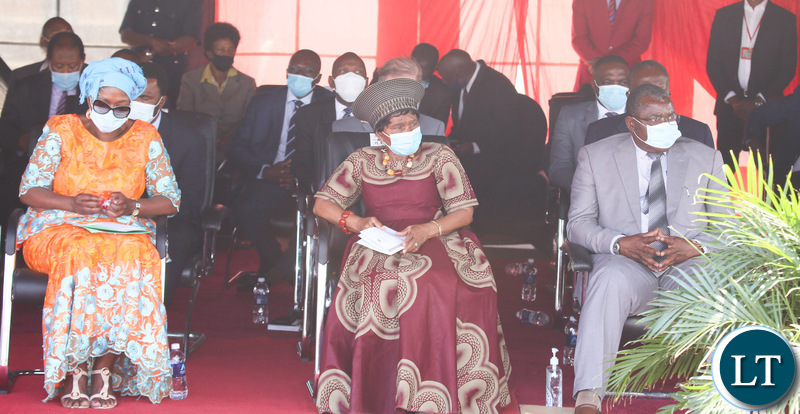 Chieftiness Nkomesha Mukamombo II with Minister of Health Sylvia Masebo following the proceeding during the relaunch of COVID-19 vaccine at OYDC