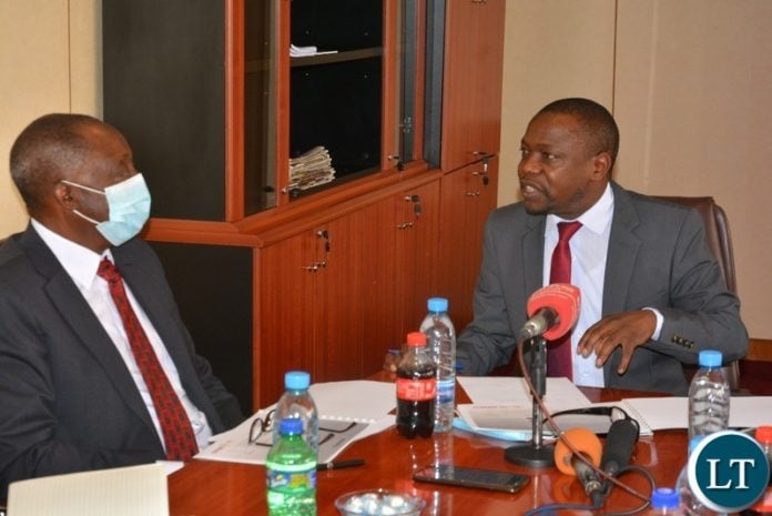 Minister of Small and Medium Enterprise, Elias Mubanga confers with Chairperson of Zanaco Board ,Hastings Mtine when they paid a courtesy call on him in Lusaka. Minister of Small and Medium Enterprise, Elias Mubanga confers with Chairperson of Zanaco Board ,Hastings Mtine when they paid a courtesy call on him in Lusaka.