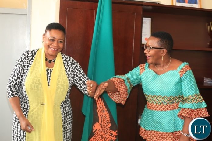 MINISTER of Labour and Social Security,Brenda Tambatamba(right) meets Zimbabwean High Commissioner to Zambia,Charity Charamba when she paid a courtesy call on her in Lusaka.